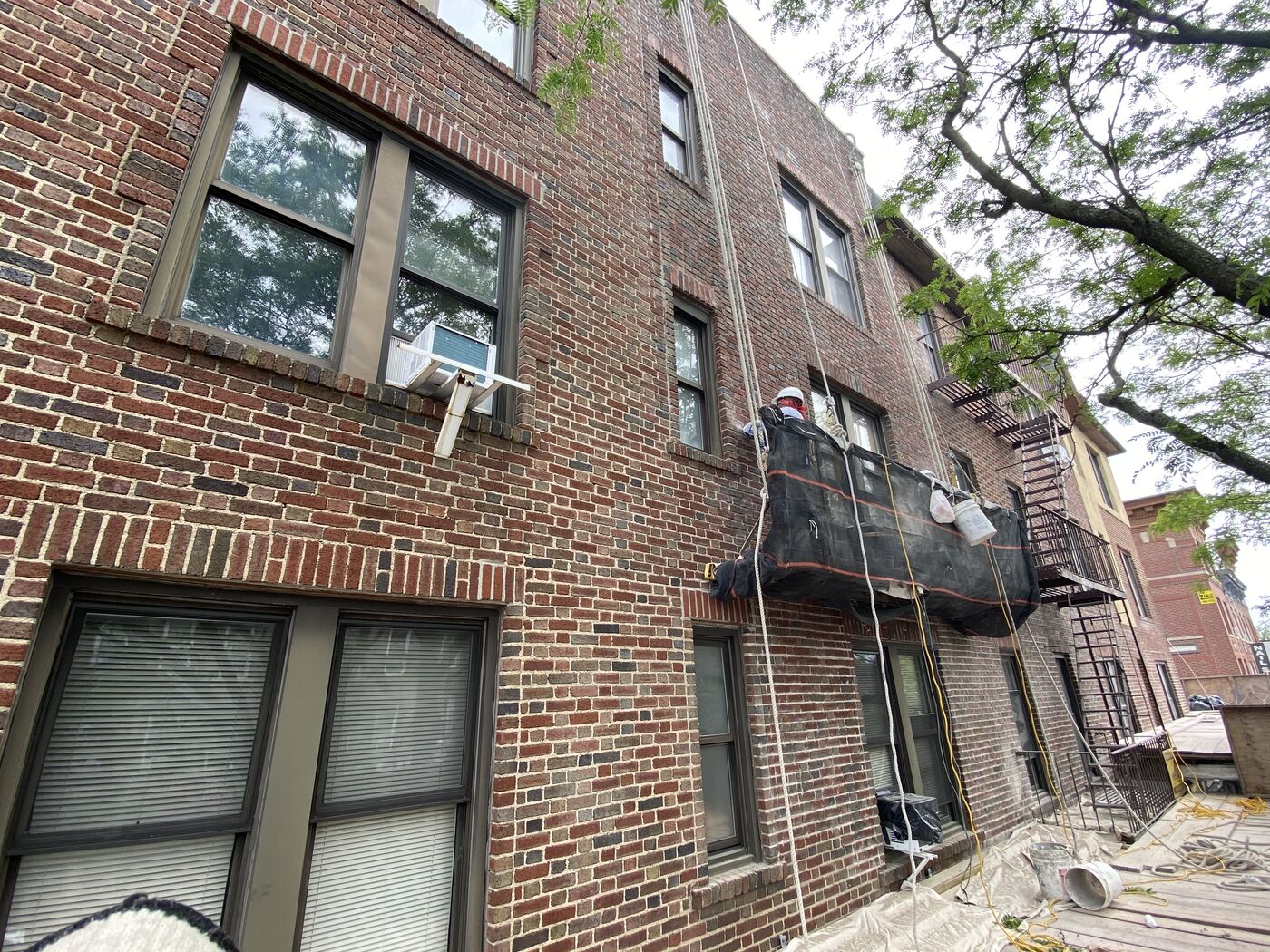 Repointed brick with color-matched mortar joints.