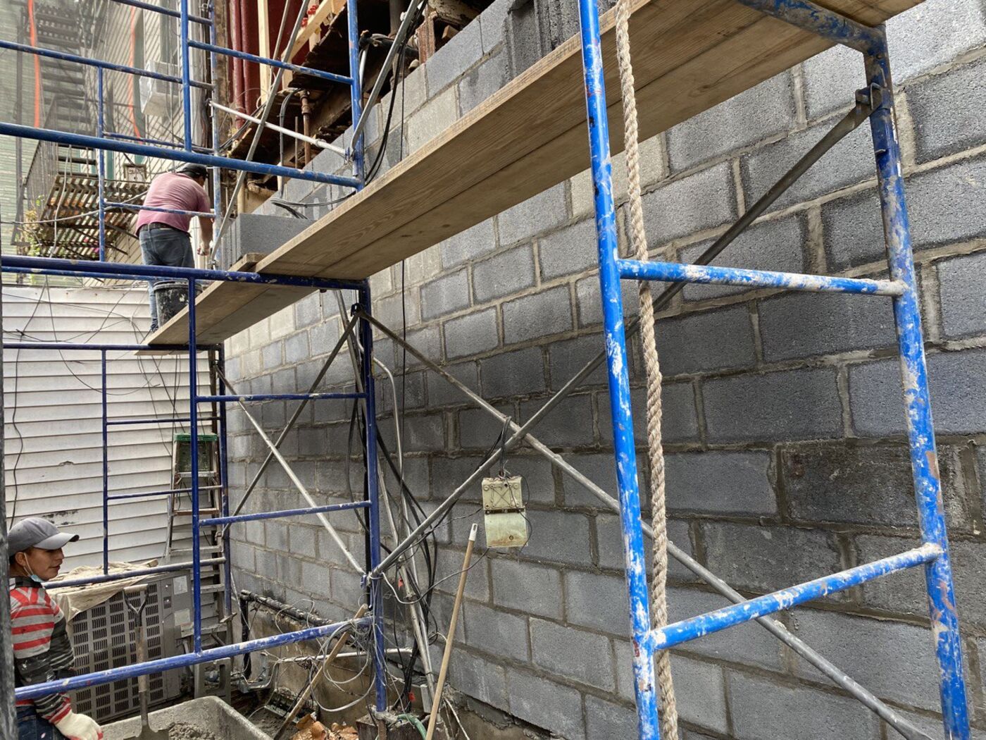 Detail of repointed brick and replacement units.