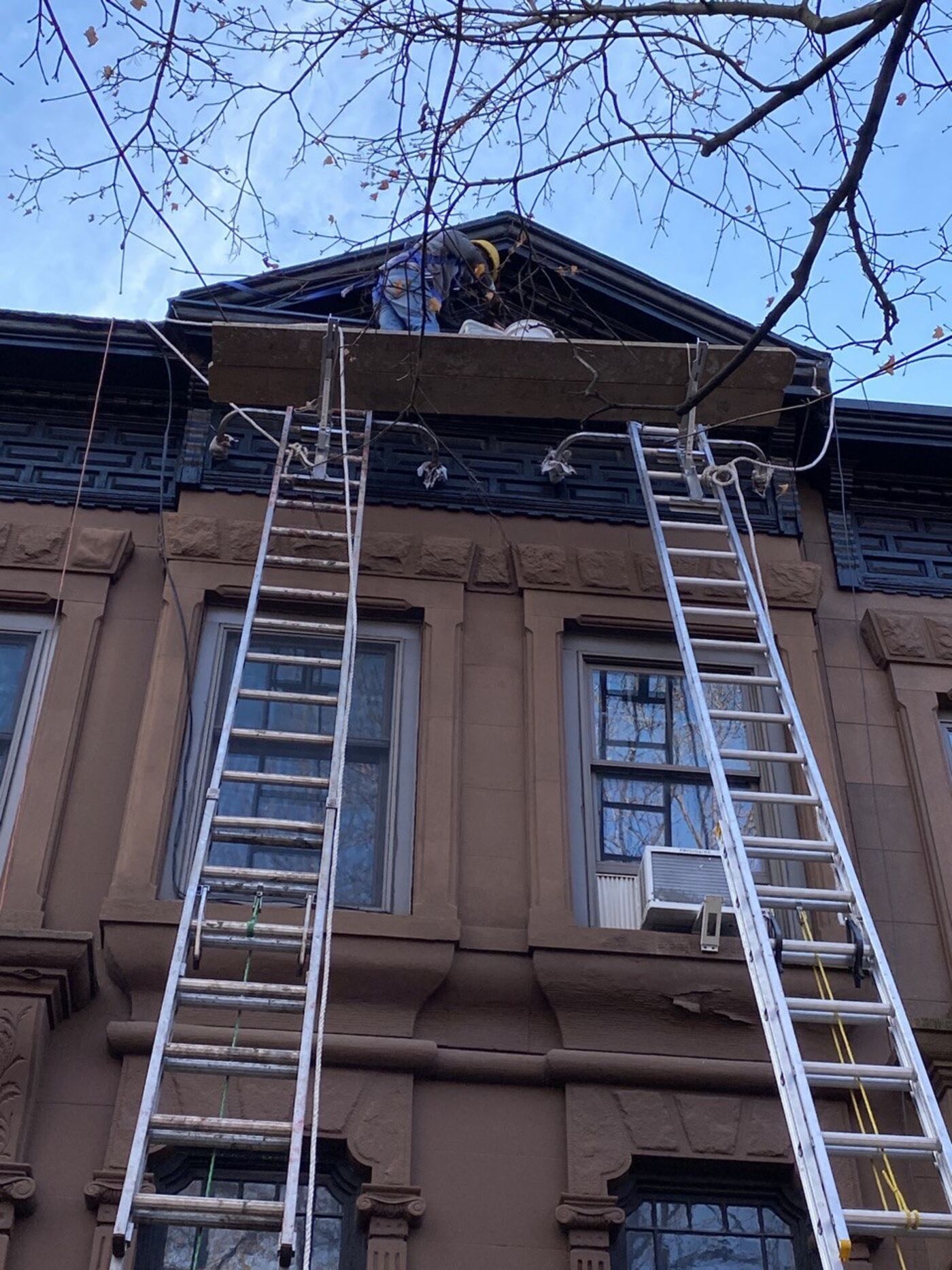 Restored cornice line with crisp paint finish.