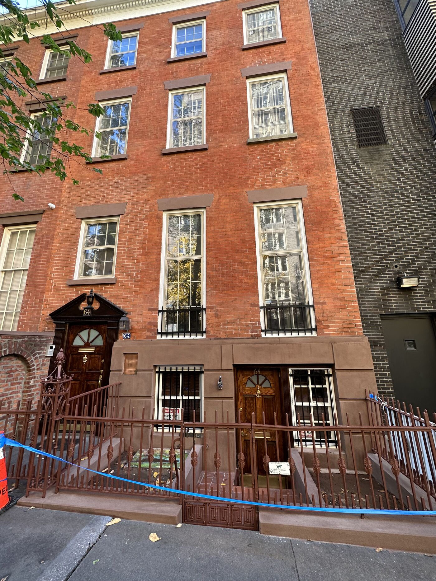 Landmark cornice and brownstone work at 64 West 12th Street, Greenwich Village